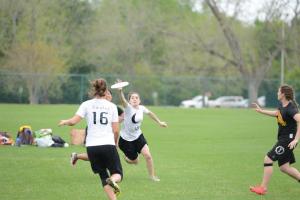 Abbey Hewitt snags a tightly contested disc at SAPP Conference Championships
